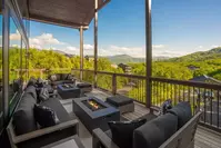electric fire pits on deck of Apres Chalet with mountain view